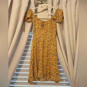 Yellow mini dress with white and black flowers